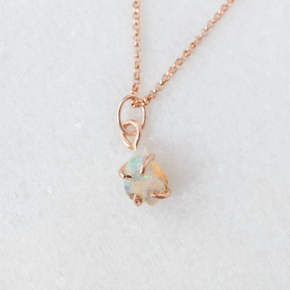 Raw opal charm 