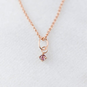 Garnet gemstone charm 