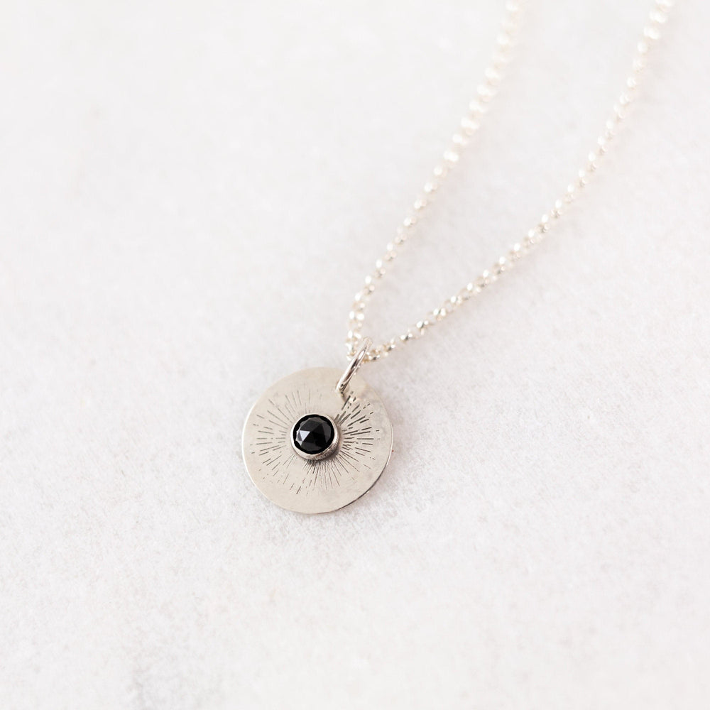 
            
                Load image into Gallery viewer, Black sun necklace
            
        