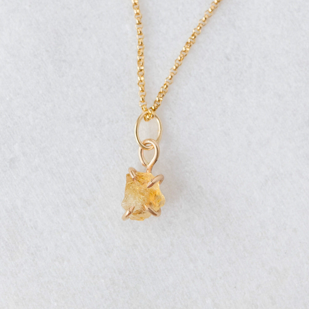 
            
                Load image into Gallery viewer, Raw citrine charm 
            
        